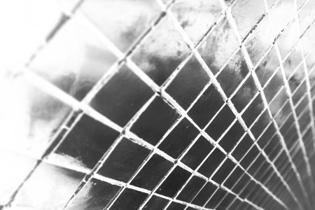 Beautiful closeup textures abstract tiles and light blue and silver glass pattern wall background and art wallpapersの写真素材
