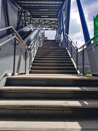 Architecture construction of elevator, escalator stairs and sky walk way, walk bridge between sky train station and department store mallの写真素材