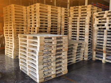 Wooden pallets stack at the freight cargo warehouse for transportation and logistics industrial