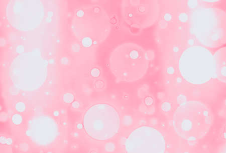 Abstract bokeh background. Bokeh lights on pink background.の写真素材
