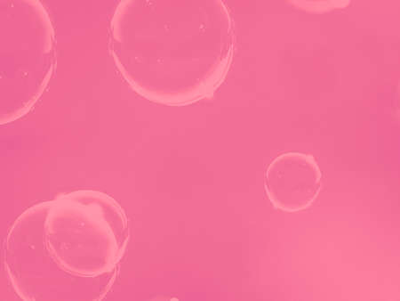Bubbles on a pink background. Abstract background for design.の写真素材