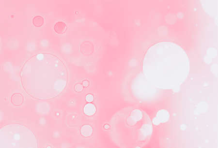 abstract pink and white bokeh light background for design.の写真素材