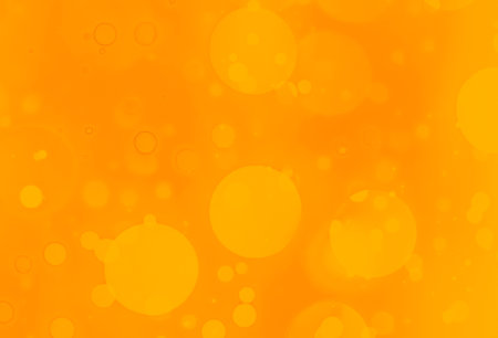 Abstract orange bokeh background with bubbles. Orange bokeh backgroundの写真素材