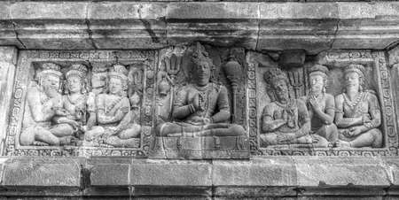 Bas-relief inside Prambanan temple complex. 9th century Hindu temple. Located near Yogyakarta on East Java, Indonesiaの写真素材