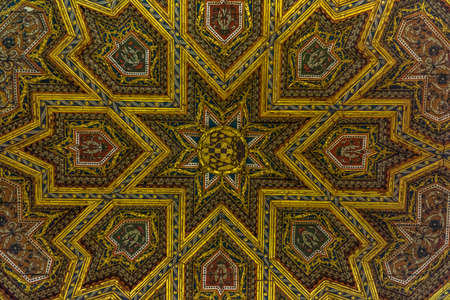 Toledo, Castille la Mancha, Spain - April 04, 2017: Mudejar style beautiful coffered ceiling of the anti-chamber next to Chapterhouse (Sala Capitular) Toledo Cathedralのeditorial素材