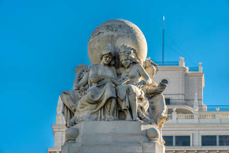 5 female figures, representing the 5 Continents, read Don Quixote, symbolizing the universal...