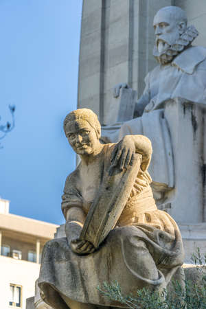 Stone statue of Aldonza Lorenzo (Dulcinea del Toboso) sculpted by Federico Coullaut-Valera from Monument to Miguel de Cervantes Saavedra in Plaza de España, Madrid, Spainのeditorial素材