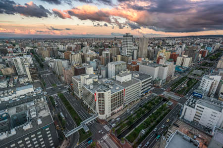 Hokkaido, August 23, 2016. Panoramic cityscape view of south-east Sapporo and Soseigawa River from TV Tower at dawn.のeditorial素材