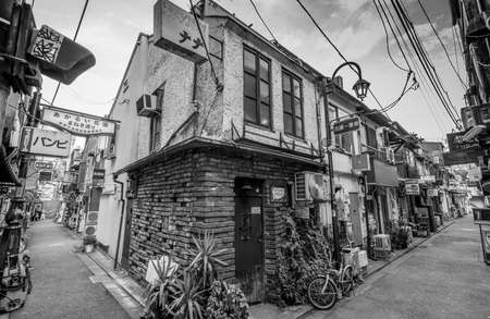 Tokyo, September 1, 2016. Small alley full of back street tiny bars in Golden Gai area during the day. Located in Kabukicho red light district, Shinjuku ward, Tokyo.のeditorial素材