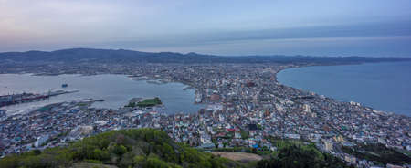 Hakodate, Hokkaido, Japan - May 14, 2016: Panoramic view of the city and suroundings from Mount Hakodate at twilightのeditorial素材