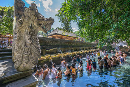 Bali, Indonesia - Sept. 9, 2017. Worshippers at cleansing ceremony at Pura Tirta Empul temple Famous for its Holy Spring Watersのeditorial素材