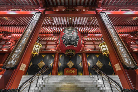Taito Ward, Tokyo - August 2, 2018 : Late night wide angle view of Main hall front entrance of Senso-ji Temple. Saisenbako (offering box) and chochin lanternのeditorial素材