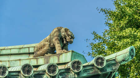 Tokyo - August 4, 2018 : Panoramic view of Onigawara (Ogre goblin tile) gargoyle style roof ornaments at Taiseidan main hall of Yushima Seido Temple. Confucian temple from Genroku era of Edo periodのeditorial素材
