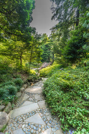 Tokyo, Bunkyo Ward - August 04, 2018 : Engetsu-kyo stone bridge at Koishikawa Korakuen Gardenのeditorial素材