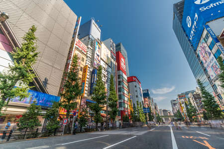Tokyo, August 5, 2018 : Motion Blurred people walking on Tokyo streets in Weekend. Hi-tech...