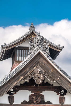 Kuri building of Tenryu-ji Temple Complex. Onigawara (Ogre tile), "Tenryuji Temple" Inscription in circular tiles (marugawara), Mitsubanagegyo and Rokuyou roof detail. Kyoto, Japanのeditorial素材