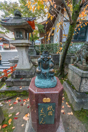 Kyoto, Japan - November 10, 2017 : Ebisu statue at  Kitamukiebisusha. Sub-temple of Yasaka Jinja. It enshrines Kotoshironushi-no-mikoto (Ebisu), Deity of wealth and business prosperityのeditorial素材