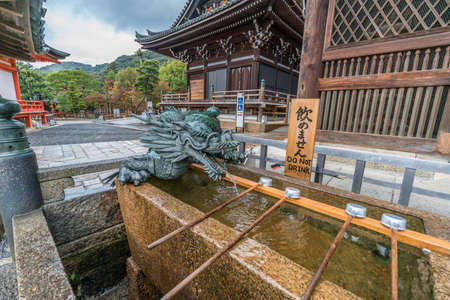 Kyoto, Japan - November 11, 2017 : Dragon and Hishaku dippers of Chozuya or Temizuya water ablution...