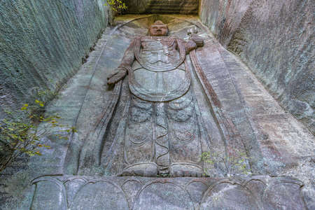 Mount Nokogiri (Nokogiriyama) Hyaku-shaku Kannon (Hundred-shaku Kannon)  tall relief image of Kannon deity (Goddess of mercy) carved into an old edo period quarry wall.のeditorial素材