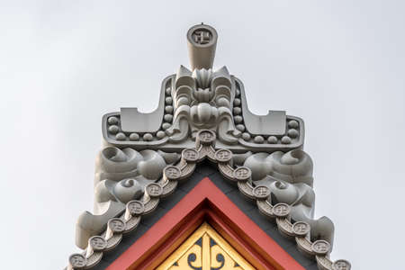 Onigawara (Ogre Tile) and Kazari-Kanagu (Metal ornaments) at Senso-ji Kannon temple Main Hall (Honden), dedicated to Guanyin, Buddhist Goddess of Mercy. Located in Asakusa, Taito Ward, Tokyoのeditorial素材