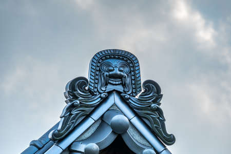 Zama city, Kanagawa Prefecture, Japan - November 15, 2017 : Onigawara (Ogre goblin Tile) at Shoukoku-ji Buddhist temple. The main deity is Hoshi no Ya kannon.のeditorial素材