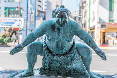 Tokyo - November 17, 2017 : Statue of a sumo wrestler fighter in Ryogoku district, Sumida Ward, Tokyo, Japanのeditorial素材