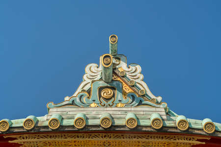 Tokyo, Chiyoda - August 5, 2018 : Kanda Myojin or Kanda Jinja. Toribusuma (bird perch tile) roof...