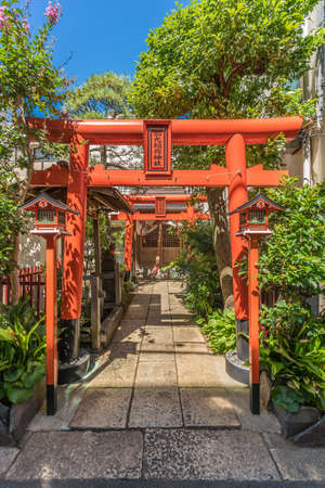 Tokyo - August 17, 2018 - Torii Gates and Honden (Main Hall) of Funekoinaka Jinja Shinto Shrine. Located in Minami Aoyama district.のeditorial素材