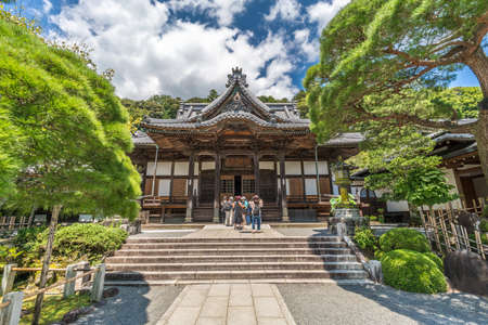 Izu, Shizuoka, Japan - August 10, 2018 : People praying at Honden (Main Hall) of Shuzenji Temple (Shuzen-ji)のeditorial素材