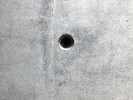 Imprint Of Hole In Concrete Wallの写真素材