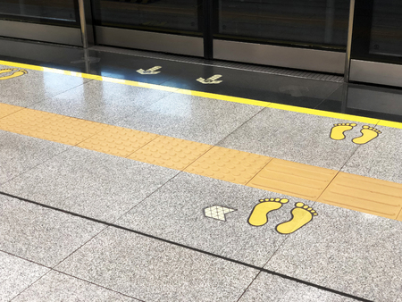 Footprint on a Floor on a Metro Station Platformの写真素材