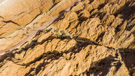 Rainbow Mountains and Stripy Zhangye Danxia Landform Geological Park in Gansu Province, China. Road in a Valley.の写真素材