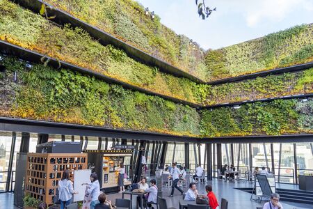 TOKYO, JAPAN - OCTOBER 6, 2018. Vertical Green Wall And Open Air Terrace. Cafe And Restaurant Is On...