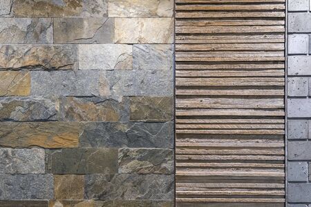 The Textured Wall by Concrete Brick, Wooden Planks and Natural Stone Tiles.