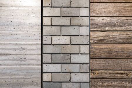 The Textured Wall by Concrete Brick, Timber Boards and the Natural Stone Grey Color Panel.の写真素材