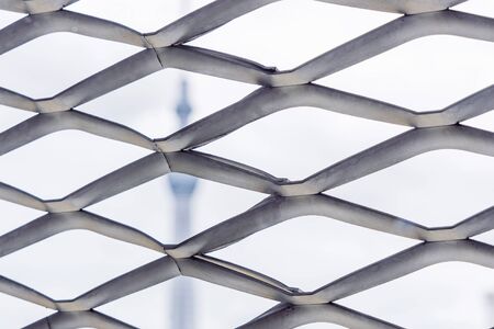 Close-Up View of Expanded Metal Mesh Panels and Blurred Background. Modern Material.