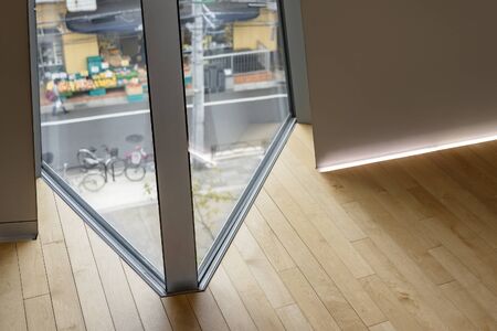 Inserted Curtain Wall Window Timber Floor. Detailed Joint of Corner. Lighting Skirting Board.の写真素材