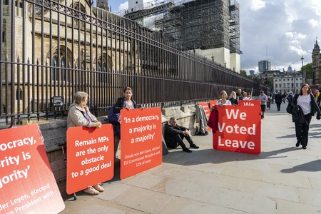 LONDON, UNITED KINGDOM - OCTOBER 1, 2019. Group of People are Supporting Brexit and Having a Rally by Palace of Westminster Supporting Brexit.のeditorial素材
