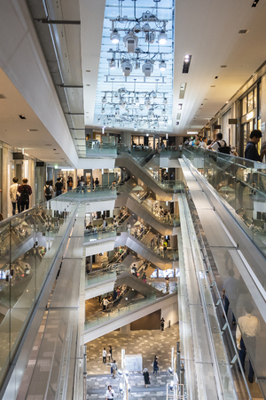 TOKYO, JAPAN - OCTOBER 7, 2018. Interior of Omotesando Hills, Shopping Mall Designed by Tadao Ando.のeditorial素材