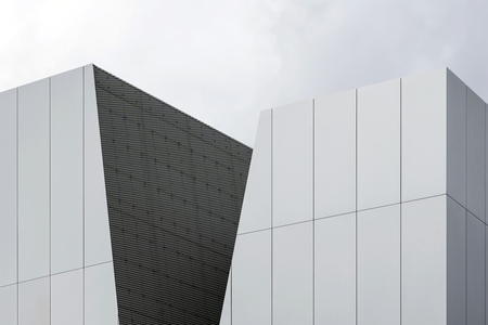 TOKYO, JAPAN - OCTOBER 8, 2018. Sumida Hokusai Museum by SANAA. Aluminum Cladding and Expanded Metal Mesh Panels. Simple Grey Silver Cut Facade.のeditorial素材