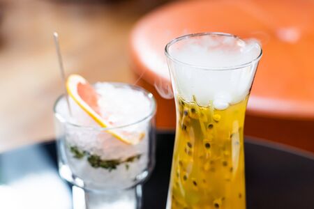 Steam is Coming Out from Passion Fruit Juice. Refreshing Summer Drink.の写真素材