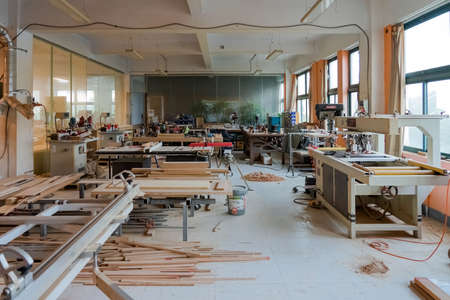 Interior Space of Woodwork Workshop. Set of Carpenter's Equipment and Work Benches in Joiner's wood Shop.のeditorial素材
