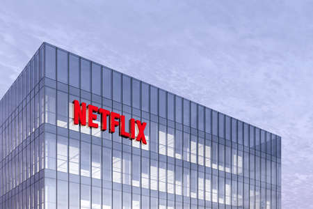 Los Gatos, CA, USA. February 17, 2021. Editorial Use Only, 3D CGI. Netflix Signage Logo on Top of Glass Building. Workplace in High-rise Office Headquarter.のeditorial素材