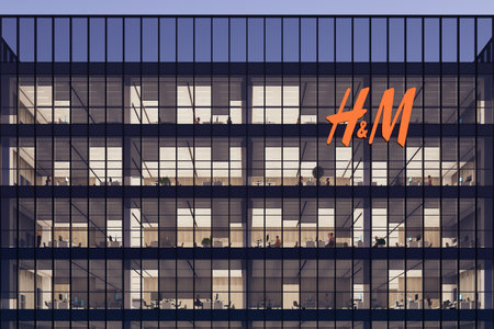 Stockholm, Sweden. May 2, 2022. Editorial Use Only, 3D CGI. H&M Signage Logo on Top of Glass Building. Workplace of Clothing Company Office Headquarters.のeditorial素材