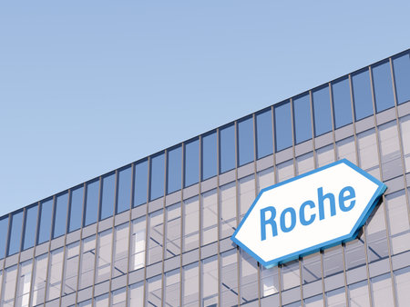 Basel, Switzerland. May 2, 2023. Editorial Use Only, 3D CGI. Roche Signage Logo on Top of Glass Building. Workplace Pharmaceutical Company Office Headquarters.のeditorial素材