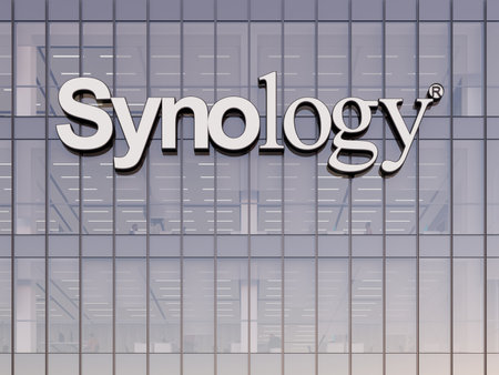 Taipei, Taiwan. May 2, 2023. Editorial Use Only, 3D CGI. Synology Technology Signage Logo on Top of Glass Building. Workplace Hardware Company Office Headquarters.のeditorial素材