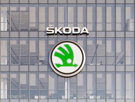 Mlada Boleslav, Czech Republic. May 2, 2023. Editorial Use Only, 3D CGI. Skoda Auto Company Signage Logo on Top of Glass Building. Workplace Vehicles Automaker Office Headquarters.のeditorial素材