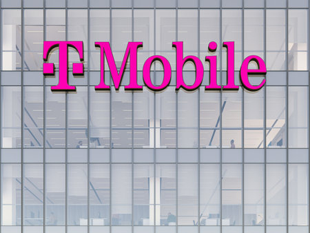 Bonn, Germany. May 2, 2023. Editorial Use Only, 3D CGI. T-Mobile Signage Logo on Top of Glass Building. Multinational Mobile Telecommunication Company Office Headquarters.のeditorial素材