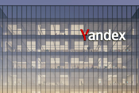 Moscow, Russia. May 2, 2022. Editorial Use Only, 3D CGI. Yandex Signage Logo on Top of Glass Building. Workplace of Technology Company Office Headquarters.のeditorial素材