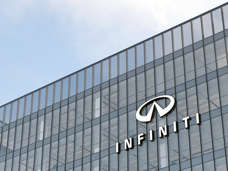 Yokohama, Kanagawa, Japan. May 2, 2023. Editorial Use Only, 3D CGI. Infiniti Motor Company Signage Logo on Top of Glass Building. Workplace Luxury Vehicles Office Headquarters.のeditorial素材